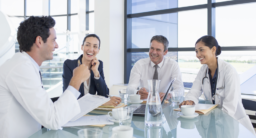 A round of scientists in a meeting