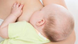 A baby is breastfed