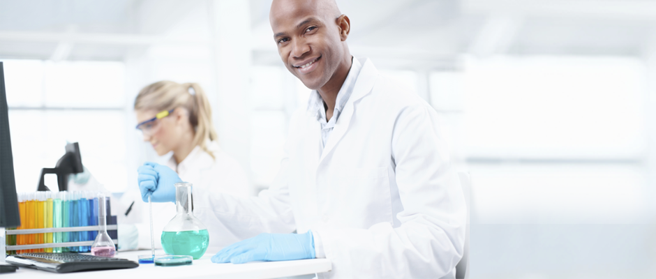 A female and a male scientist at work in a laboratory